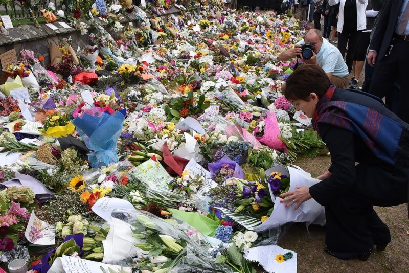 Patsy_Reddy_lays_flowers_at_Hagley_Park